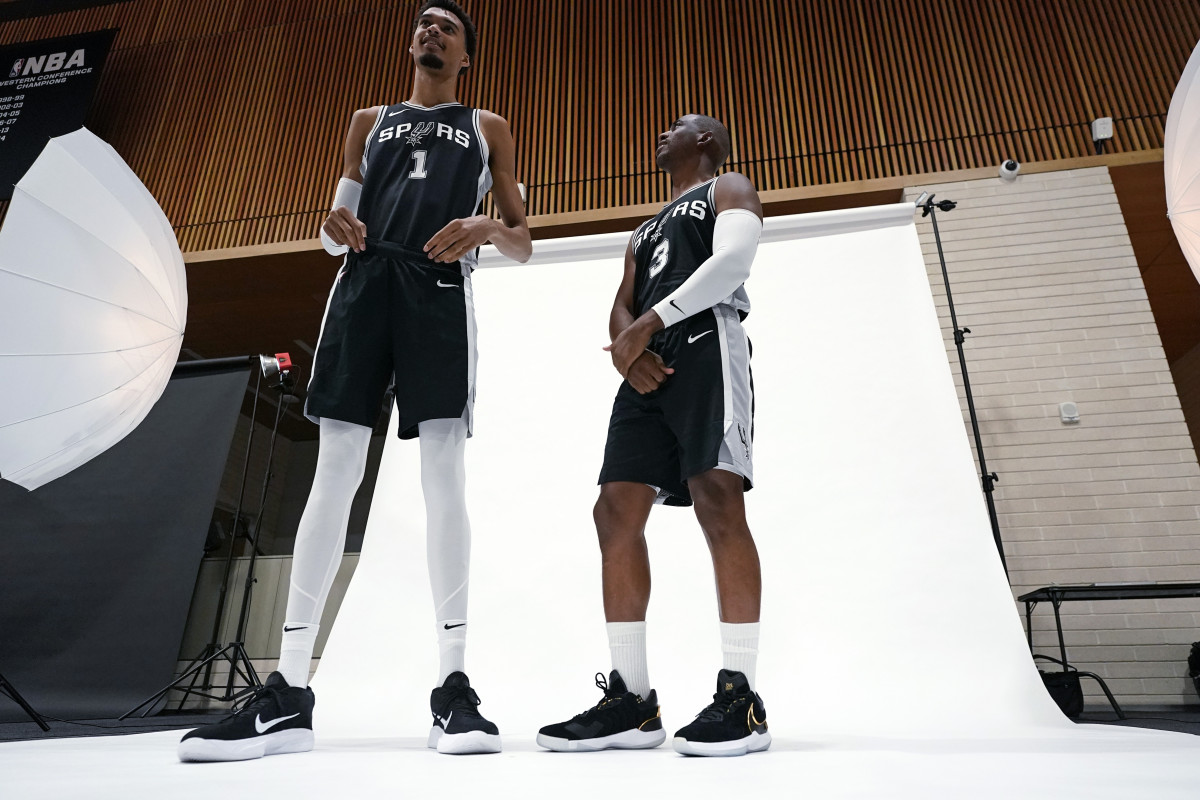 San Antonio Spurs guard Chris Paul (3) and forward Victor Wembanyama (1).