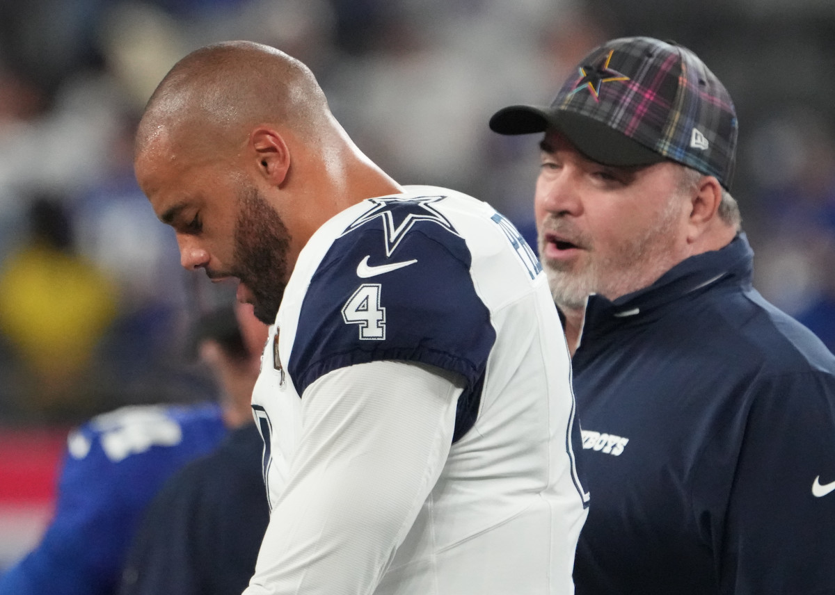 Dallas Cowboys quarterback Dak Prescott and head coach Mike McCarthy on the sidelines.