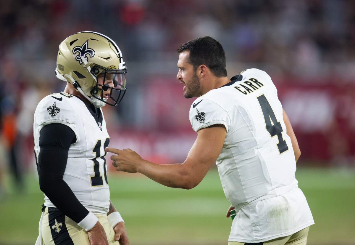 Derek Carr and Spencer Rattler of the New Orleans Saints