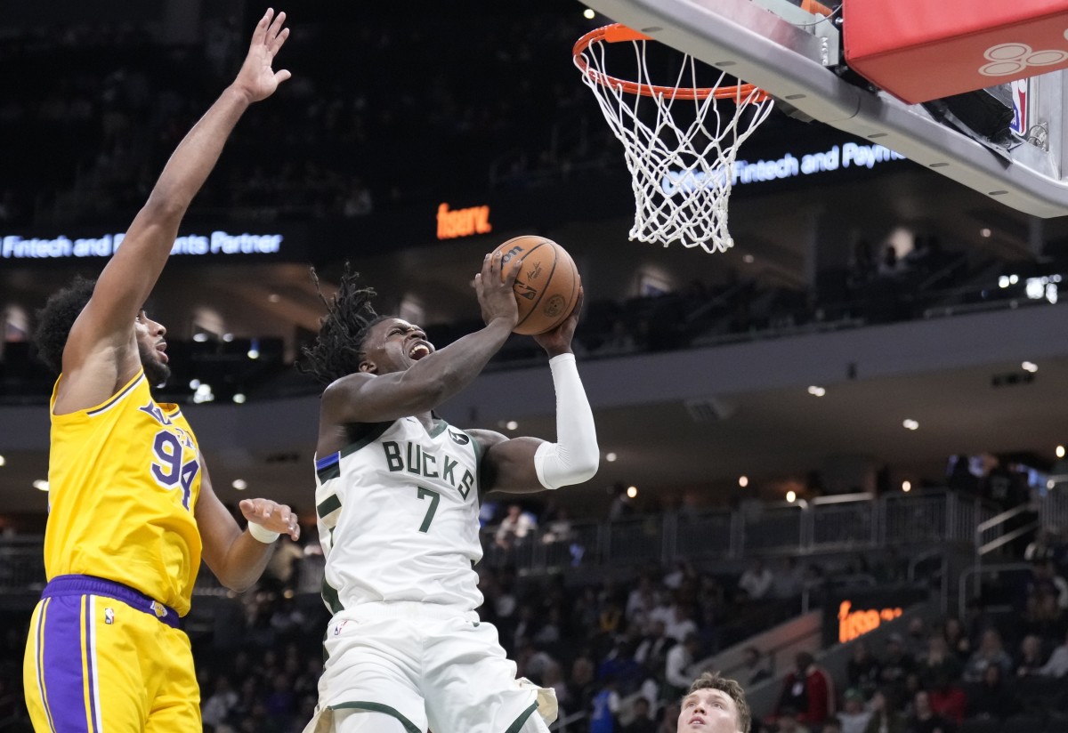 Milwaukee Bucks forward Chris Livingston (7) shoots against Los Angeles Lakers forward Armel Traore (94) in the second half at Fiserv Forum.