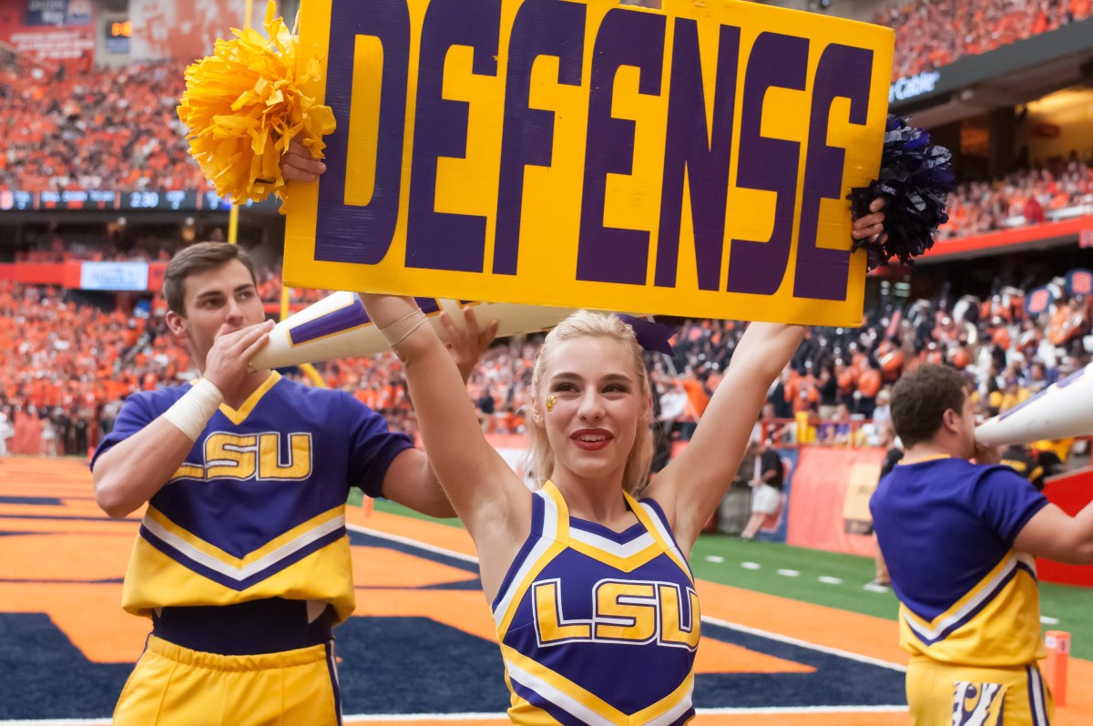 College Football Cheerleader Turns Heads After Shoving Opposing Player ...