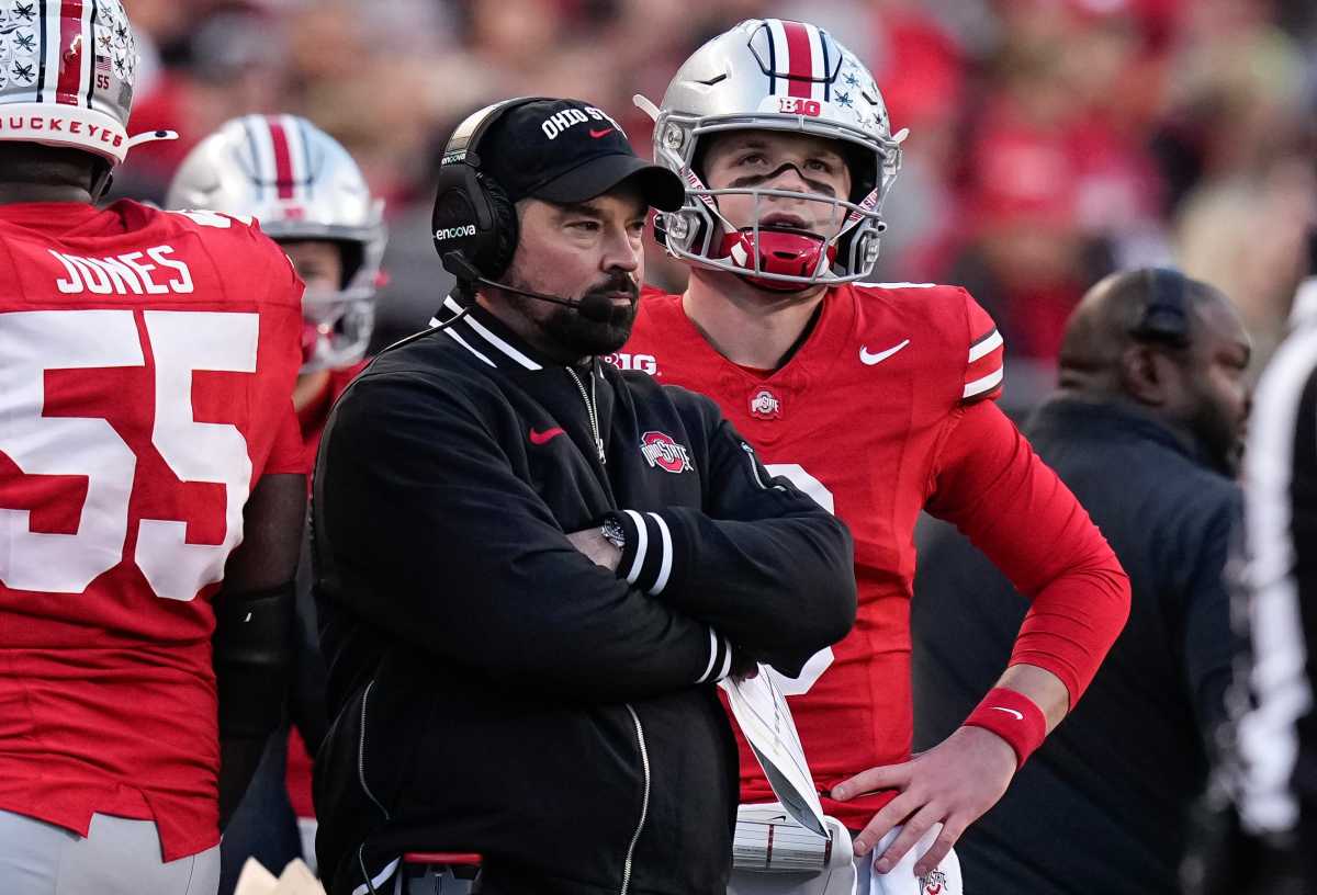 Nov 18, 2023; Columbus, Ohio, USA; Ohio State Buckeyes quarterback Kyle McCord (6) looks at a replay on the scoreboard behind head coach Ryan Day during the NCAA football game against the Minnesota Golden Gophers at Ohio Stadium.