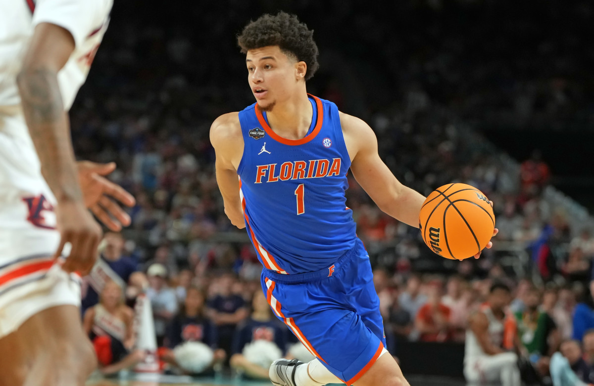 Florida Gators guard Walter Clayton Jr. dribbles the ball against the Auburn Tigers during the men's Final Four.