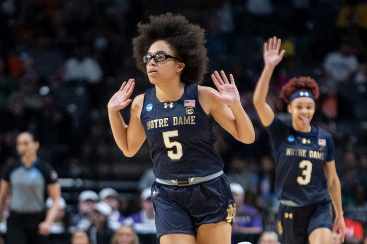 Notre Dame Fighting Irish guard Olivia Miles (5) celebrates a three-pointer during Notre Dame's Sweet 16 loss to the TCU Horned Frogs.