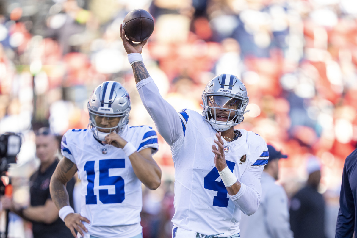 Dallas Cowboys quarterback Dak Prescott (4) passes the football in front of quarterback Trey Lance (15) before the game against the San Francisco 49ers at Levi's Stadium.