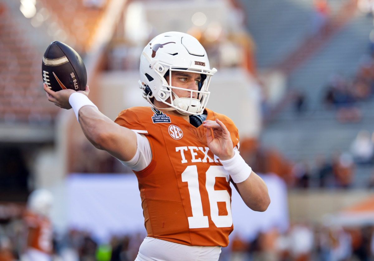 Texas Longhorns quarterback Arch Manning (16) warms up against the Clemson Tigers during the College Football Playoff.