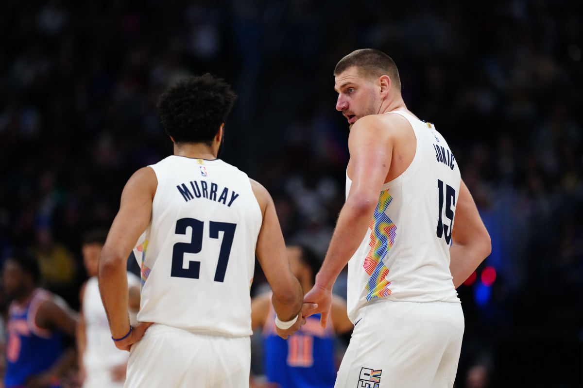 Denver Nuggets center Nikola Jokic (15) and guard Jamal Murray (27)