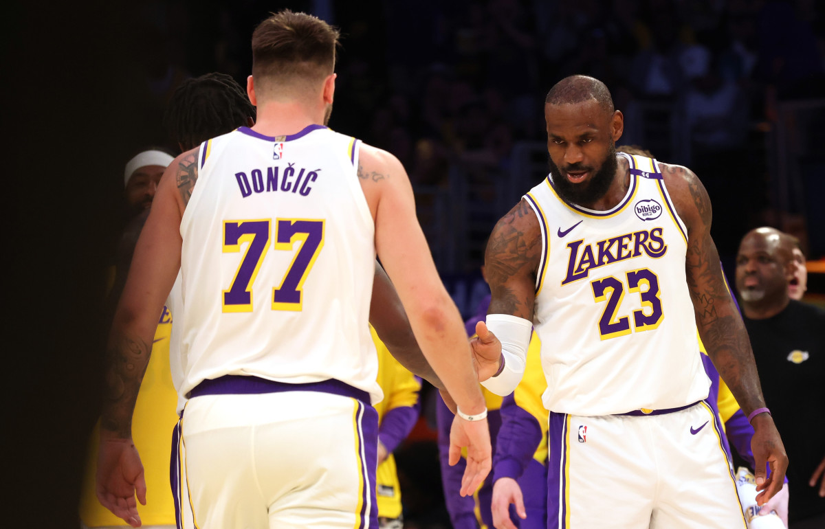 Los Angeles Lakers teammates LeBron James (23) and Luka Doncic (77).