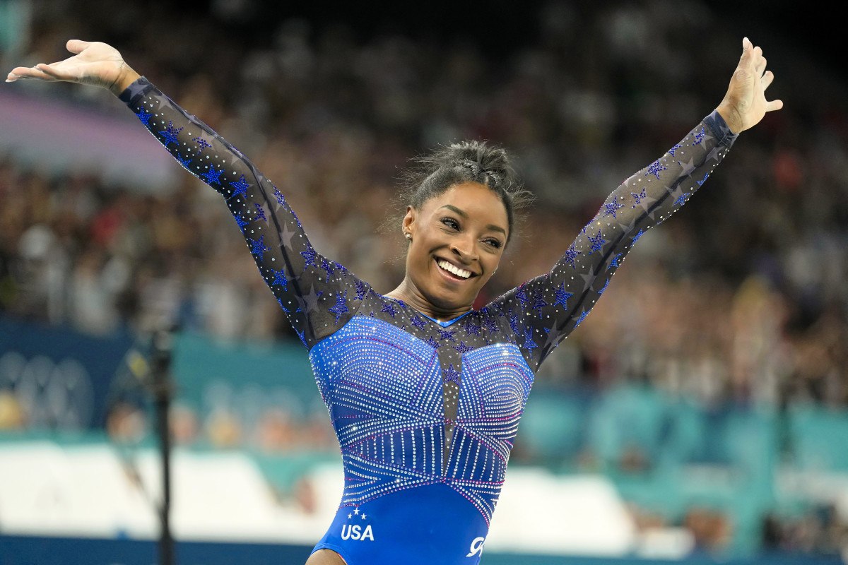 Simone Biles of the United States reacts after competing on the beam in the women's gymnastics all-around during the Paris 2024 Olympic Summer Games at Bercy Arena.