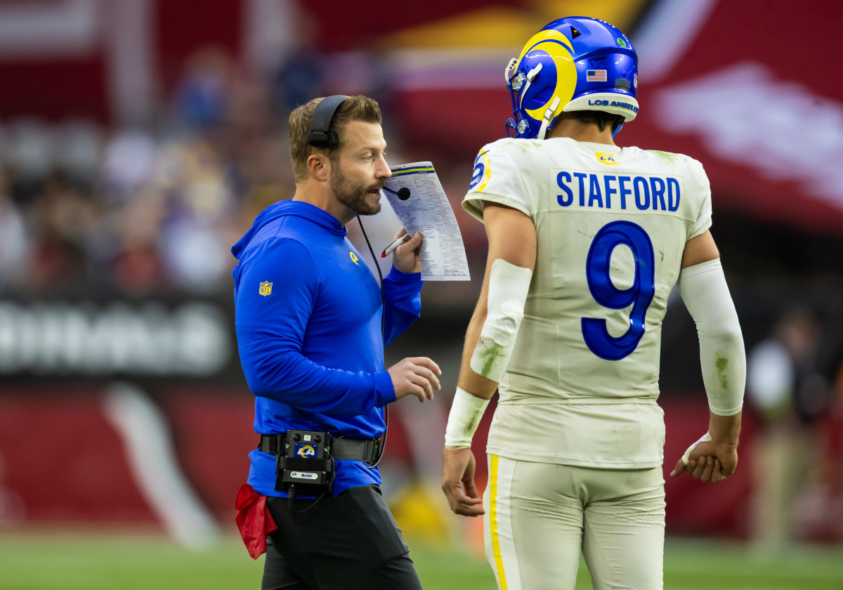 Los Angeles Rams head coach Sean McVay talks with quarterback Matthew Stafford (9).