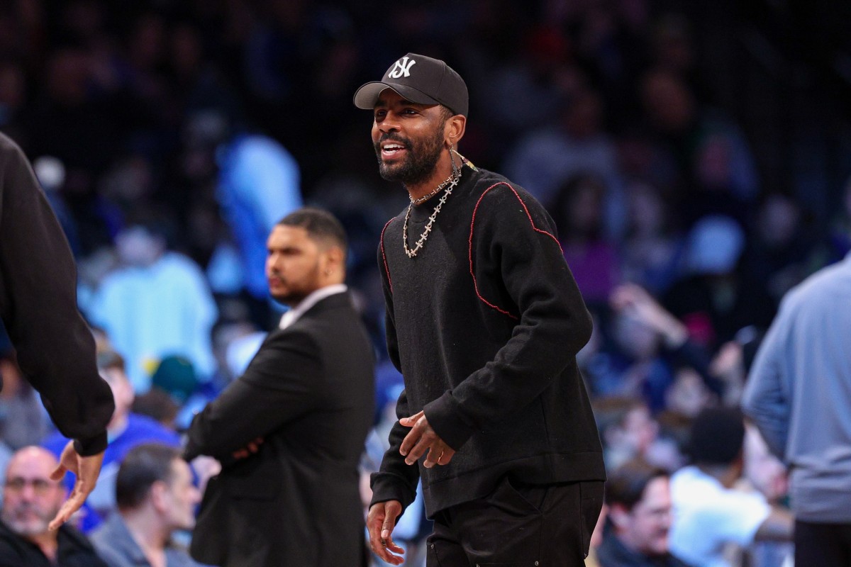 Kyrie Irving Turns Heads with Surprise Appearance at Timberwolves-Lakers Game - Athlon Sports
