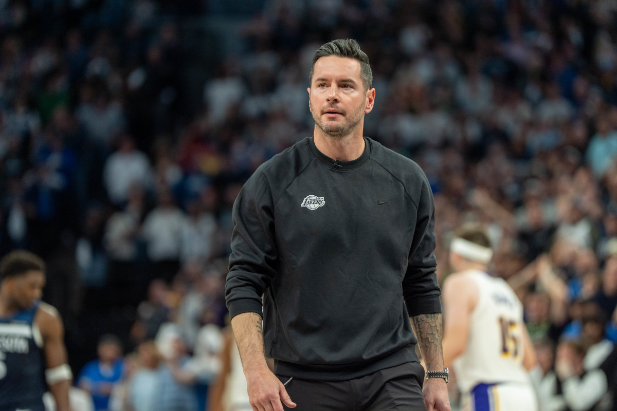 Los Angeles Lakers head coach JJ Redick reacts during a game against the Minnesota Timberwolves at Target Center.