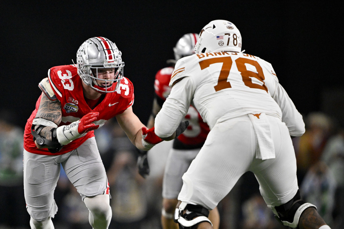 Ohio State Buckeyes defensive end Jack Sawyer (33) rushes against Texas Longhorns offensive lineman Kelvin Banks Jr. (78). Mandatory Credit: Jerome Miron-Imagn Images