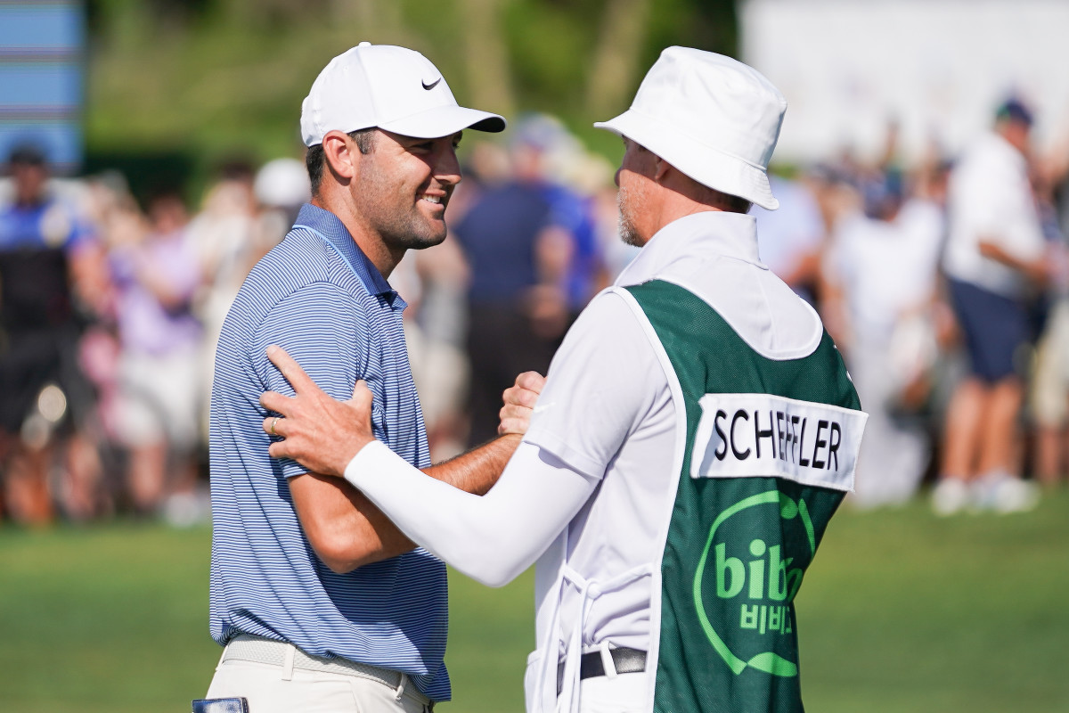 Scottie Scheffler and his caddy at the Byron Nelson Classic.