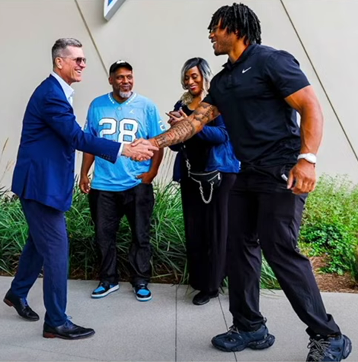 Jim Harbaugh Clears the Air on Viral Photograph With First Round Pick Omarion Hampton - Athlon Sports
