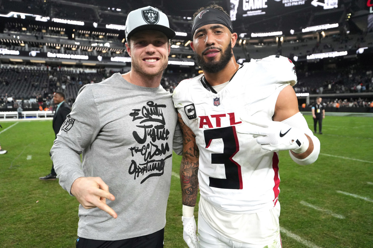 Atlanta Falcons safety Jessie Bates III takes a picture after a game against the Las Vegas Raiders. Kirby Lee-Imagn Images
