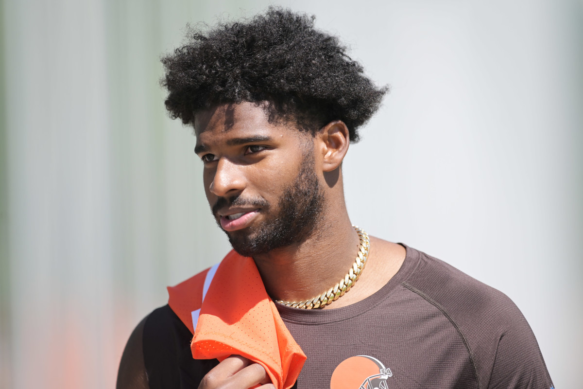 Cleveland Browns quarterback Shedeur Sanders (12) walks off the field after rookie minicamp at CrossCountry Mortgage Campus.