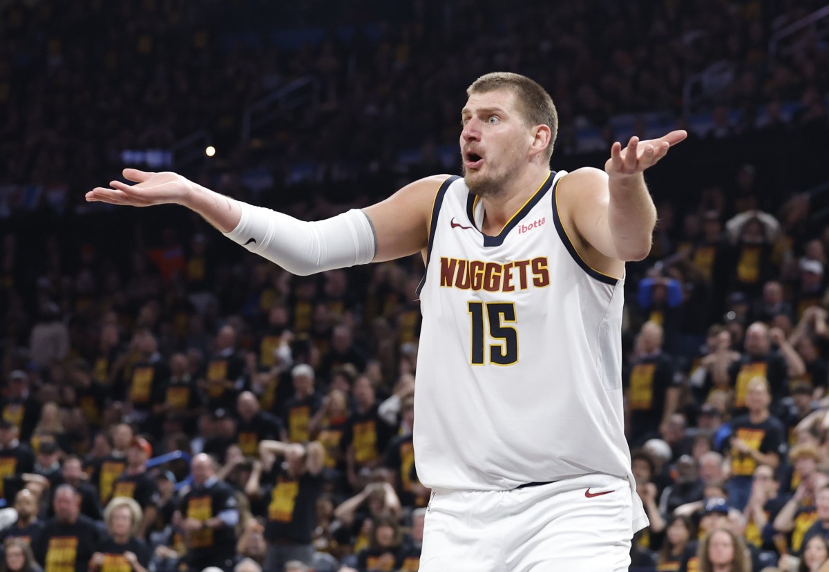 Denver Nuggets center Nikola Jokic (15) complains during a game.