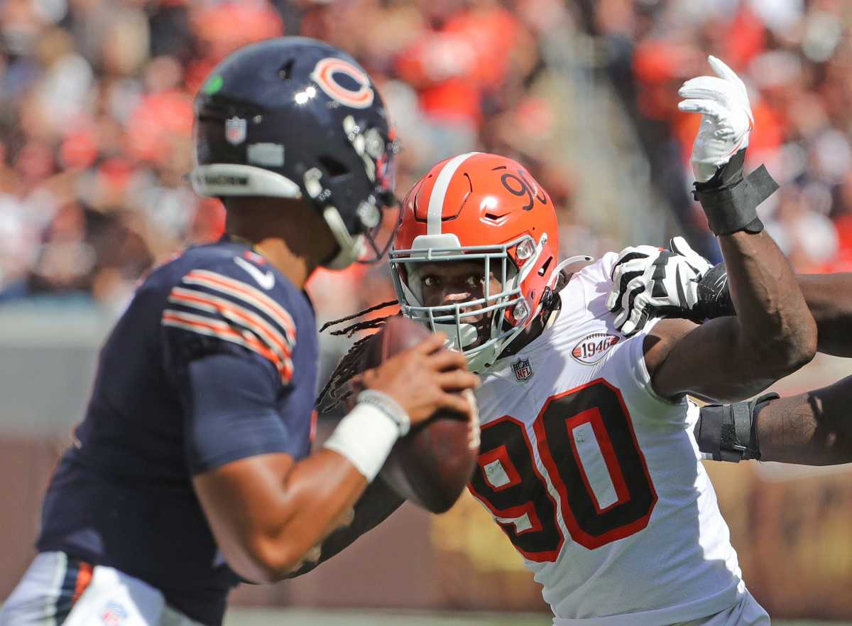 Jadeveon Clowney pressures Bears quarterback Justin Fields during their 2021 matchup.