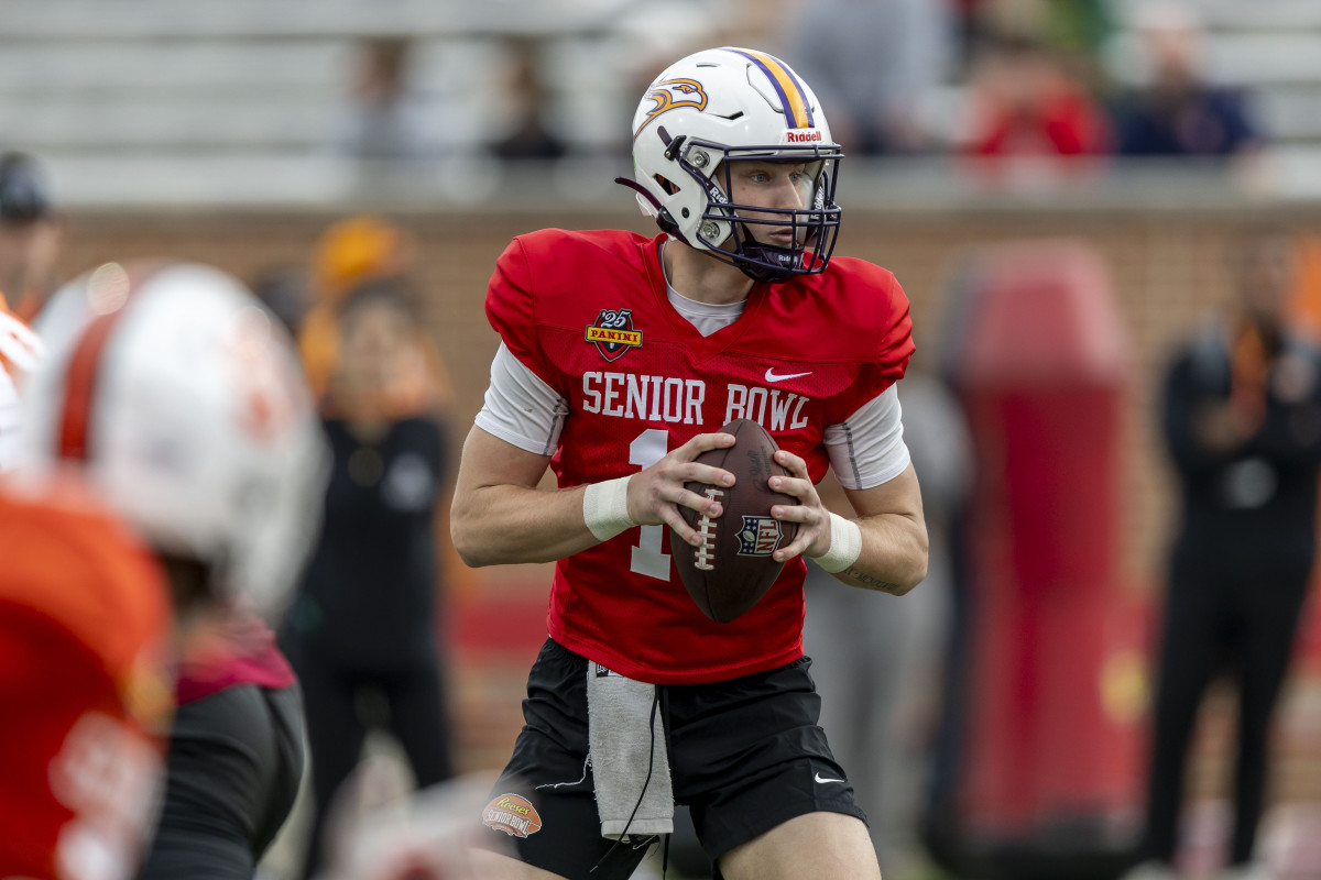 Canadian national team QB Taylor Elgersma (18) runs drills during Senior Bowl practice.