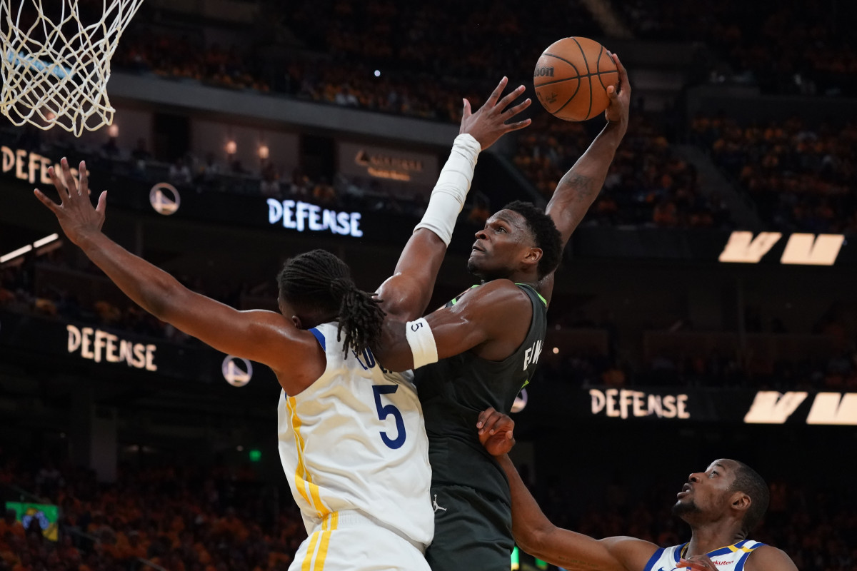 Minnesota Timberwolves guard Anthony Edwards (5) dunks over Golden State Warriors forward Kevon Looney (5) in the third quarter during game three in the second round for the 2025 NBA Playoffs at Chase Center.