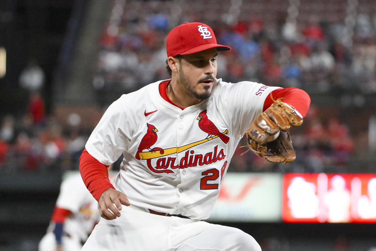 St. Louis Cardinals third baseman Nolan Arenado (28) fields a ground ball against the Pittsburgh Pirates during the sixth inning at Busch Stadium.