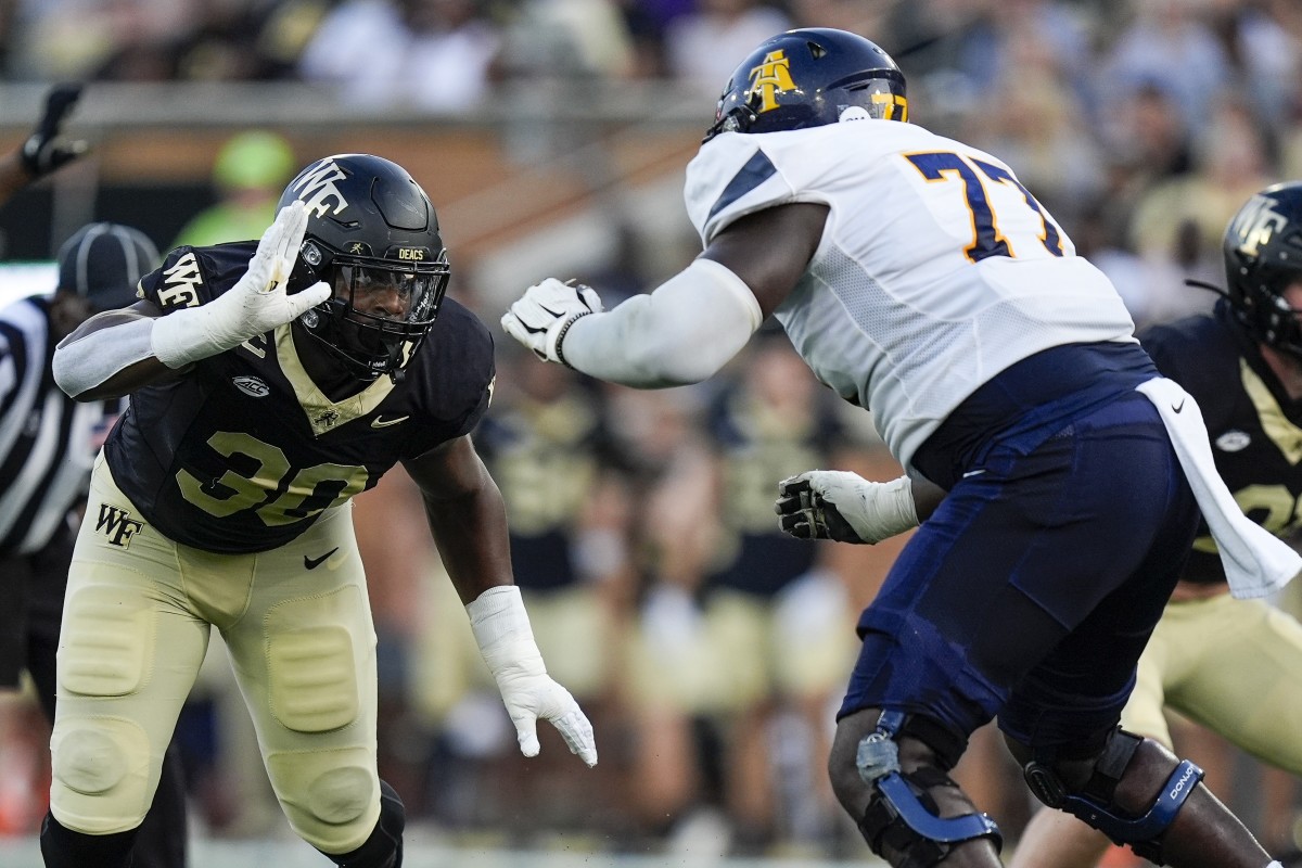 Wake Forest Demon Deacons defensive lineman Jasheen Davis (30) rushes against the North Carolina A&T Aggies. Mandatory Credit: Jim Dedmon-Imagn Images