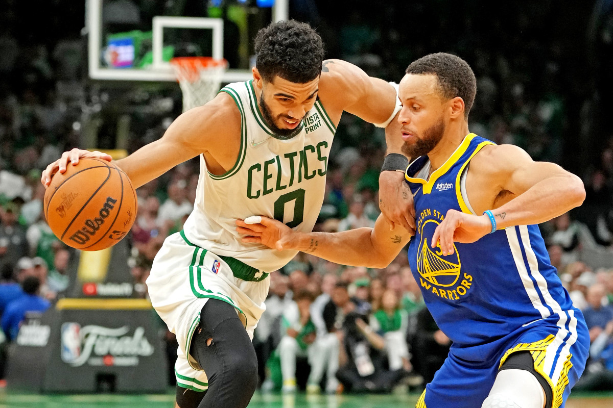 Boston Celtics forward Jayson Tatum (0) and Golden State Warriors guard Stephen Curry (30).