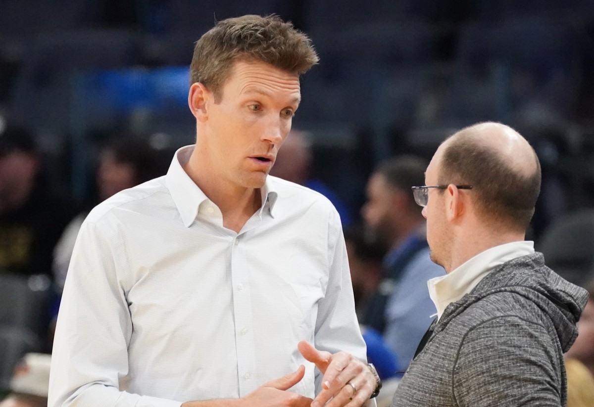 Jan 4, 2025; San Francisco, California, USA; Golden State Warriors general manager Mike Dunleavy chats before the game against the Memphis Grizzlies at Chase Center. Mandatory Credit: David Gonzales-Imagn Images  