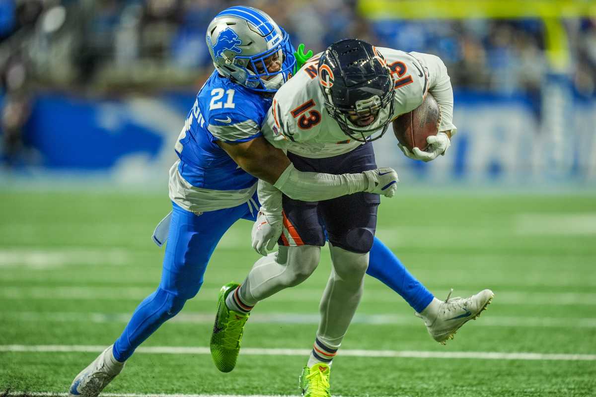 Detroit Lions cornerback Amik Robertson tackling Keenan Allen