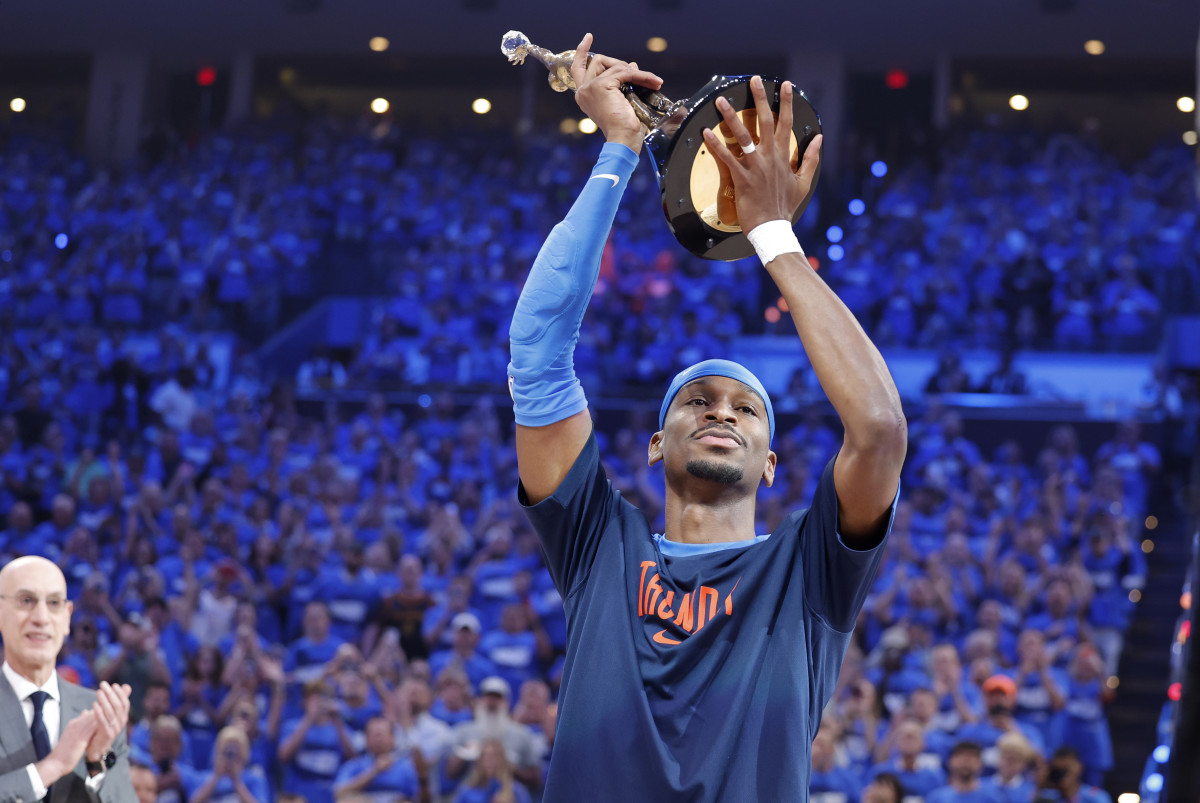 Oklahoma City Thunder guard Shai Gilgeous-Alexander (2) with the Michael Jordan Trophy for winning the most valuable player award for the 2024-25 season.