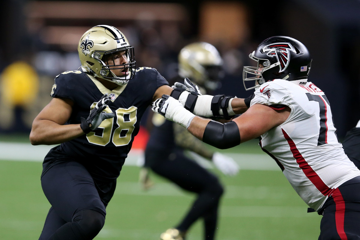 Nov 7, 2021; New Orleans Saints defensive end Payton Turner (98) is blocked by Atlanta Falcons offensive tackle Jake Matthews (70). Mandatory Credit: Chuck Cook-Imagn Images