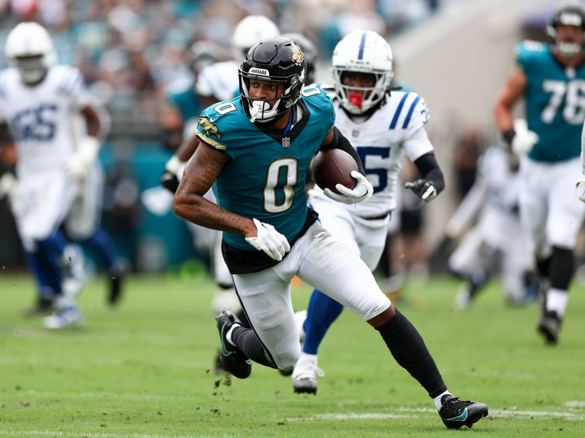 Jacksonville Jaguars wide receiver Gabe Davis runs with the ball against the Indianapolis Colts in a game at EverBank Stadium.