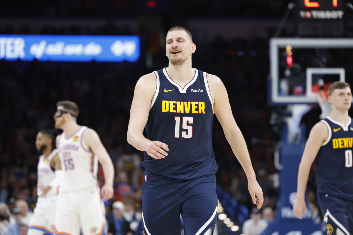 Denver Nuggets center Nikola Jokic (15) smiles after a play against the Oklahoma City Thunder at Paycom Center.
