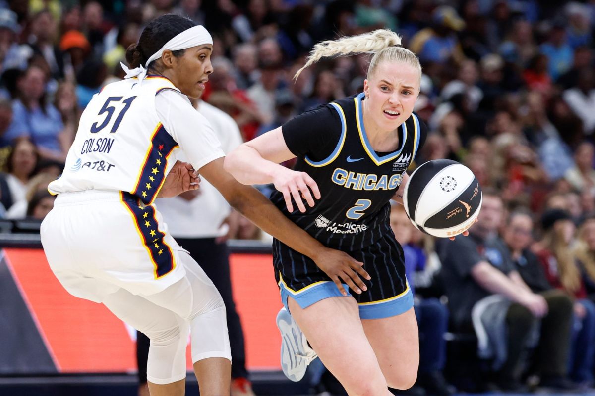 Chicago Sky guard Hailey Van Lith (2) drives to the basket against Indiana Fever guard Sydney Colson (51).