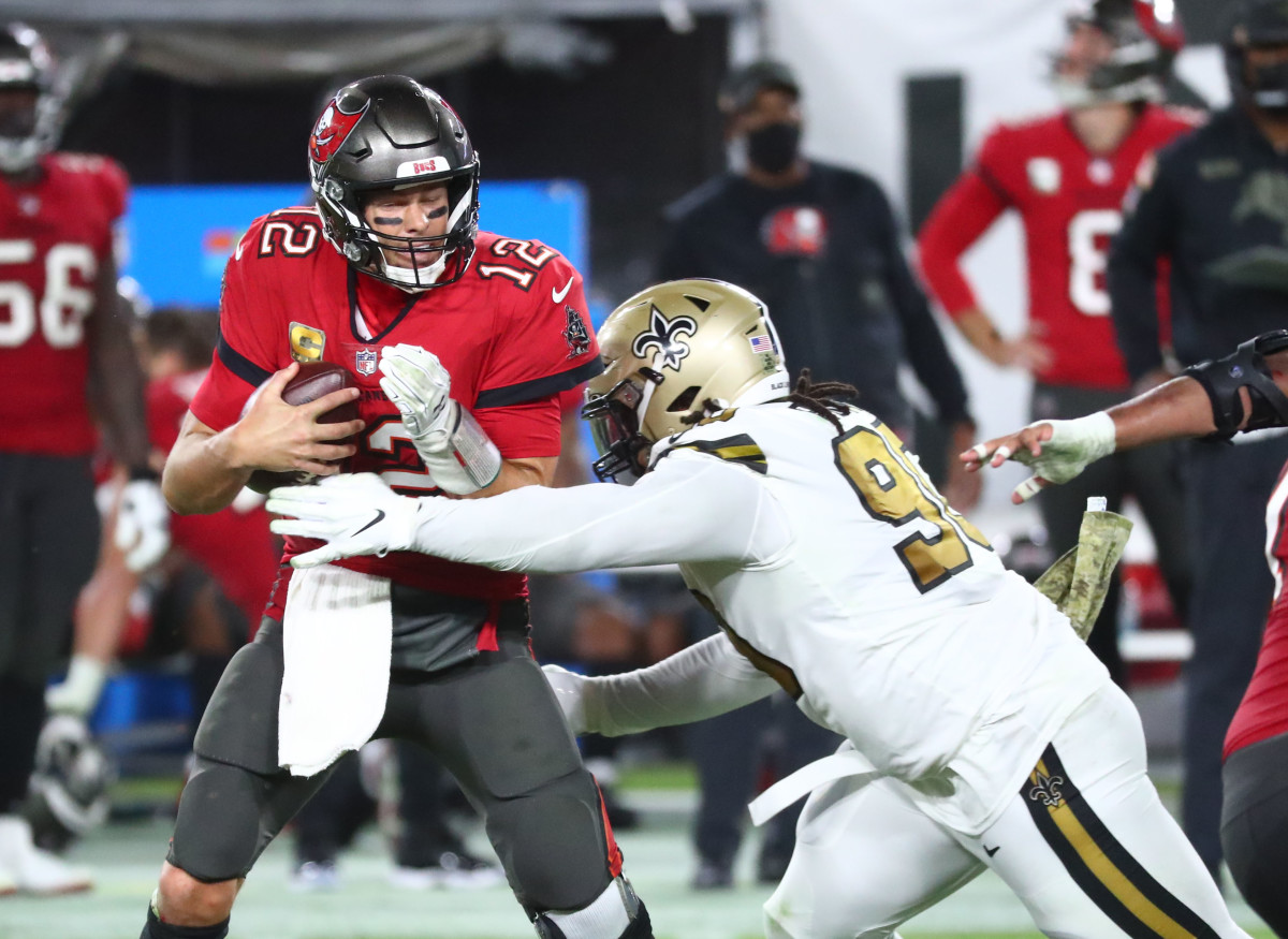 Nov 8, 2020; New Orleans Saints defensive tackle Malcom Brown (90) sacks Tampa Bay Buccaneers quarterback Tom Brady (12). Mandatory Credit: Kim Klement-Imagn Images