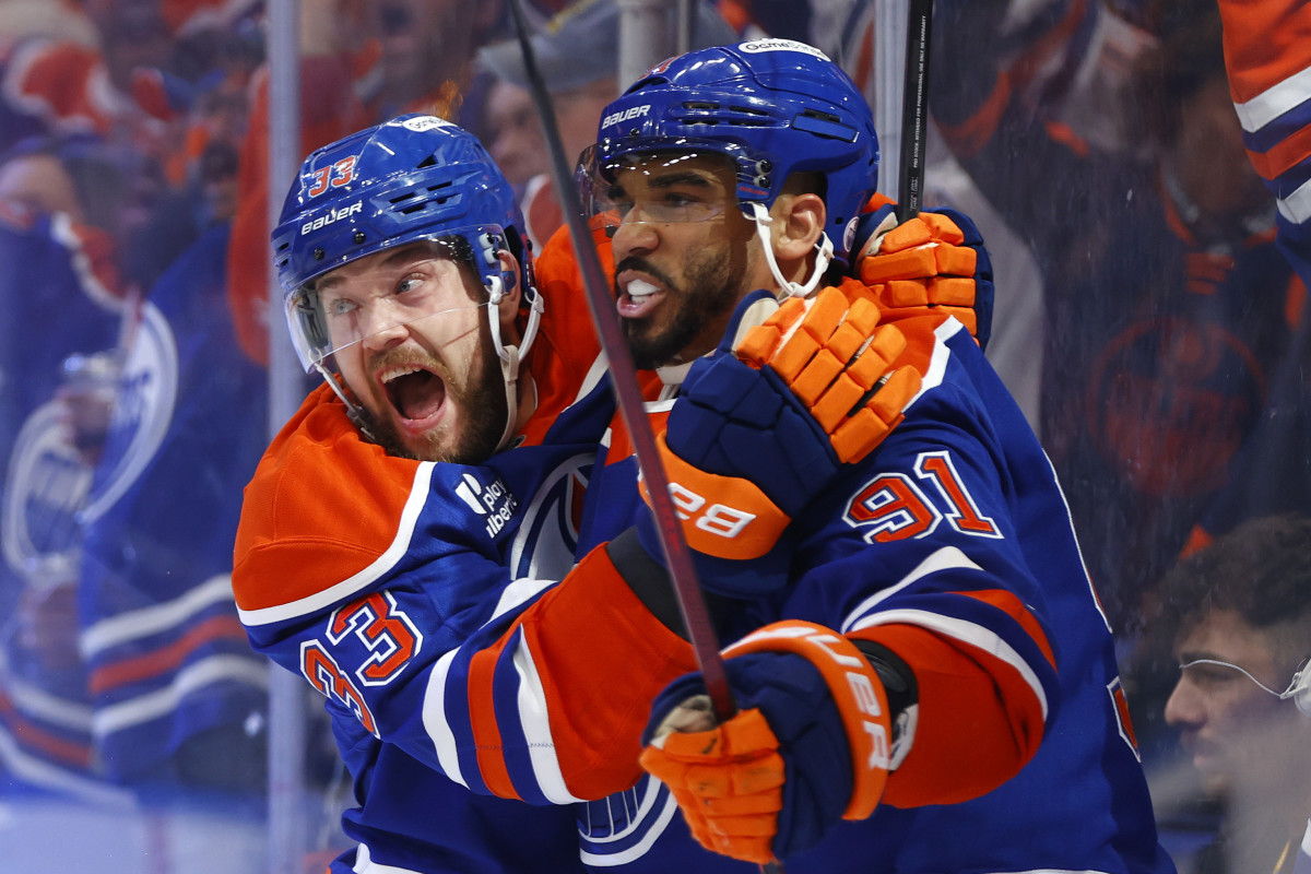 Edmonton Oilers left wing Evander Kane (91) reacts with left wing Viktor Arvidsson (33) after scoring a goal against the Florida Panthers.