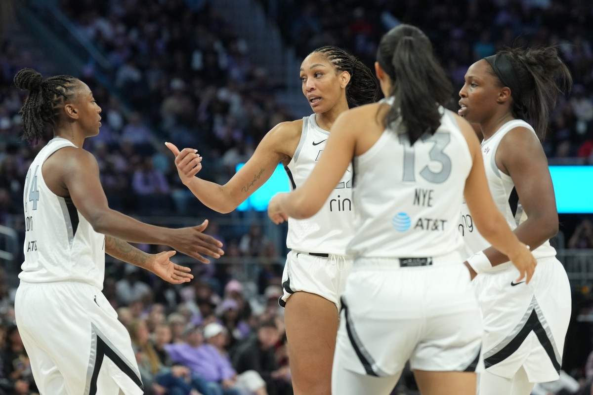 Las Vegas Aces players huddle during the fourth quarter against the Golden State Valkyries at Chase Center on June 7, 2025.