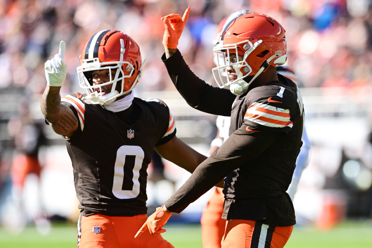 Cleveland Browns CB Greg Newsome II (0) and S Juan Thornhill (1) celebrate after a pass break up during the first half against the Baltimore Ravens.