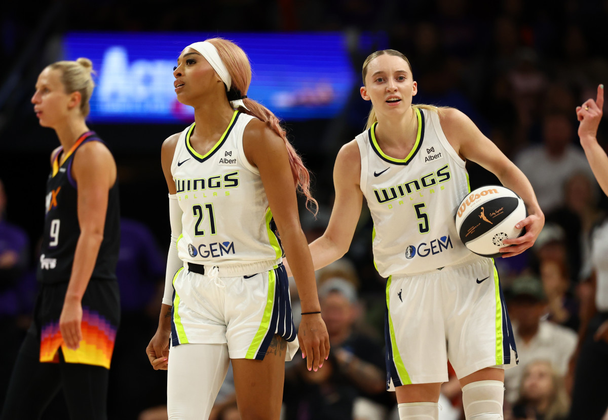 Dallas Wings guard DiJonai Carrington (#21) with rookie guard Paige Bueckers (#5)