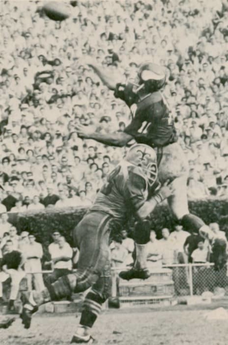 Oct. 13, 1968; New Orleans Saints defensive lineman Lou Cordileone (79) hits Minnesota Vikings quarterback Joe Kapp (11). Credit: neworleanssaintshistory.com
