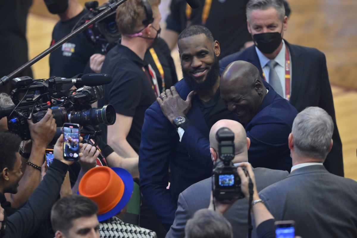 Lebron James and Michael Jordan on the court during halftime of the 2022 NBA All-Star Game at Rocket Mortgage FieldHouse.