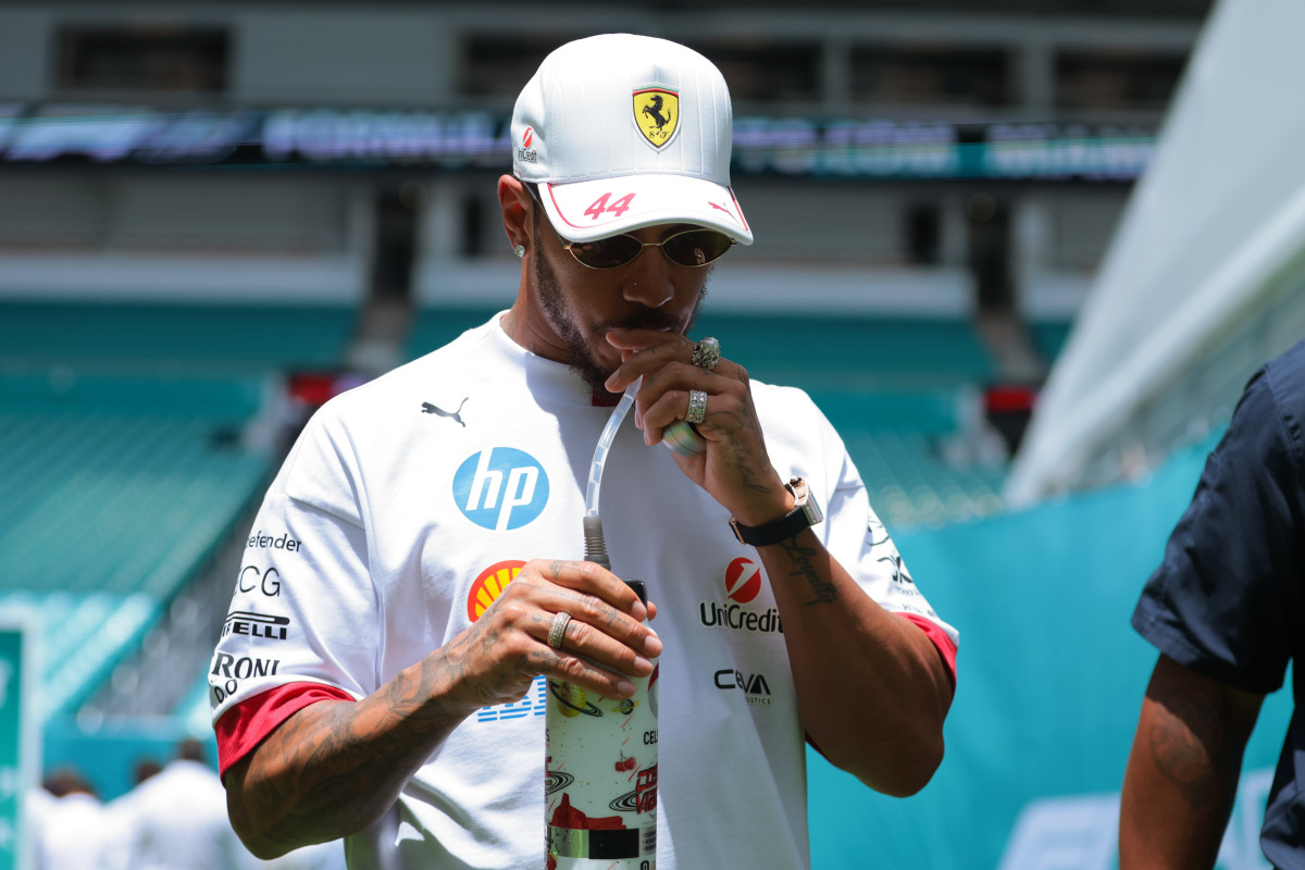Lewis Hamilton walks the paddock area at Miami International Autodrome.