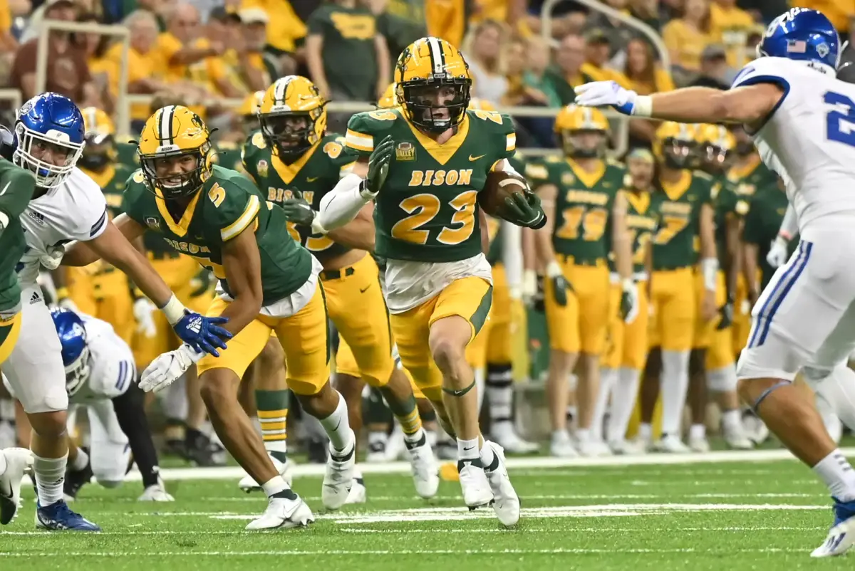 Cornerback Jayden Price of North Dakota State returns an interception. Credit:North Dakota State Bison/gobison.com
