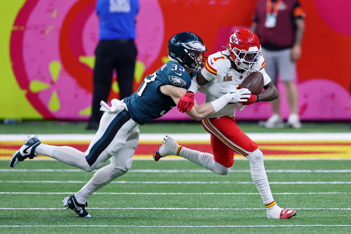 Kansas City Chiefs wide receiver Xavier Worthy (1) and Philadelphia Eagles cornerback Cooper DeJean (33)