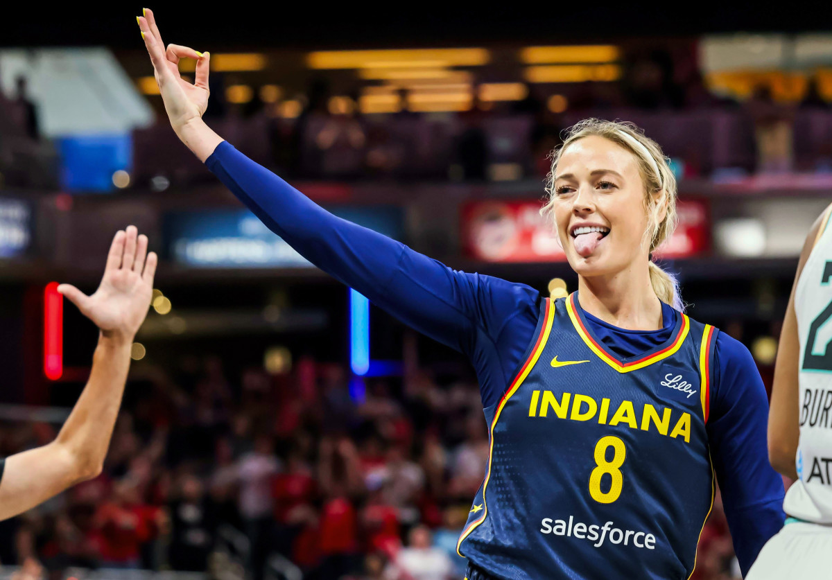 Indiana Fever guard Sophie Cunningham celebrates a made basket.