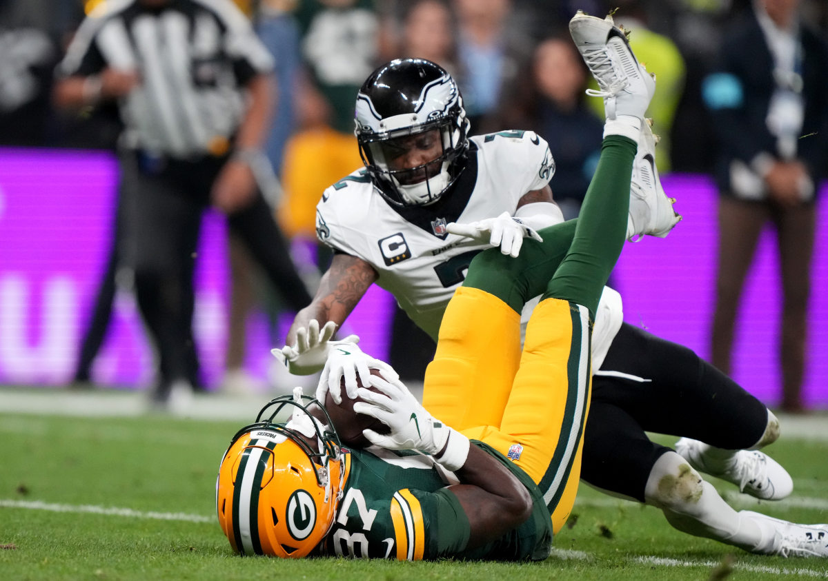 Green Bay Packers wide receiver Romeo Doubs (87) makes a catch against Philadelphia Eagles cornerback Darius Slay Jr. (2).
