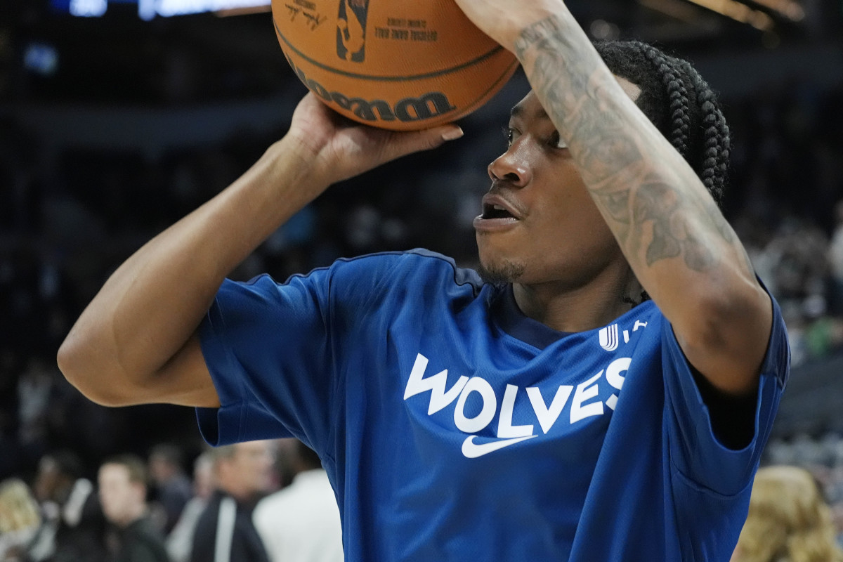 Minnesota Timberwolves guard Rob Dillingham (4) prepares to play.
