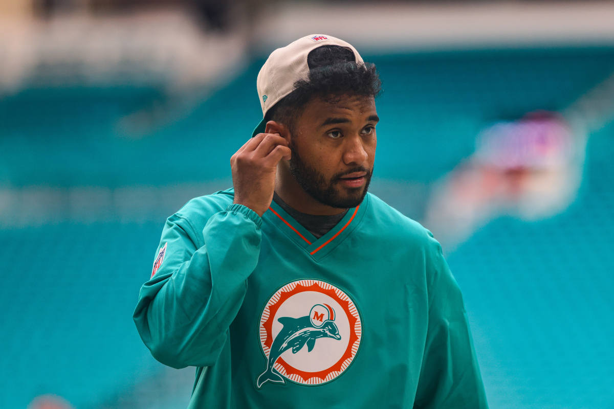 Sep 12, 2024; Miami Gardens, Florida, USA; Miami Dolphins quarterback Tua Tagovailoa (1) walks on the field before a game against the Buffalo Bills at Hard Rock Stadium. Mandatory Credit: Sam Navarro-Imagn Images