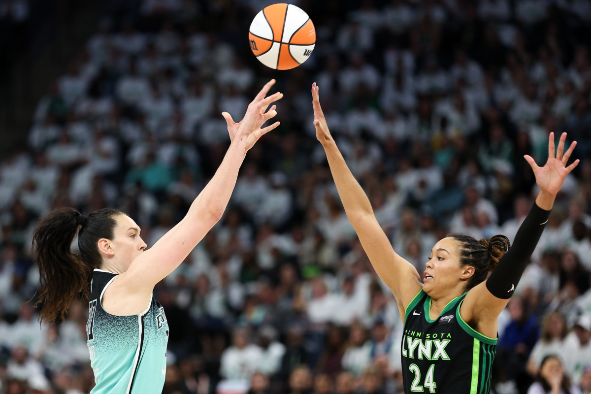 Liberty star Breanna Stewart shoots against Lynx counterpart Napheesa Collier in Game 3 of the 2024 WNBA Finals.